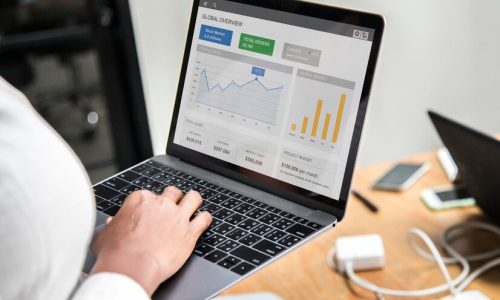 businesswoman-working-laptop_53876-163211